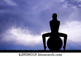 Pilates silhouette at sunset Pilates silhouette at sunset