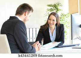 Dealer attending to a customer