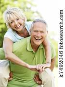 Mature couple having fun in countryside Mature couple having fun in countryside