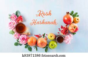 Rosh hashanah (jewish New Year holiday), Concept of traditional or religion symbols on pastel blue background. Rosh hashanah (jewish New Year holiday), Concept of traditional or religion symbols on pastel blue background.