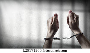 arrest - man handcuffed in prison