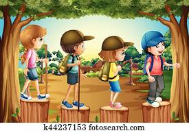 Children hiking in the woods Children hiking in the woods