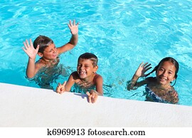 children playing in a pool children playing in a pool