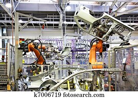 robotic arma, um carro, fábrica