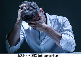Portrait of depressed man in pain Portrait of depressed man in pain