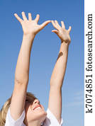 determination, child with arms raised in the air reaching out