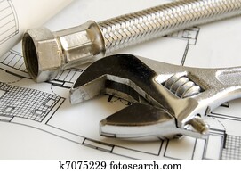 Plumbing tools on house blueprint Plumbing tools on house blueprint