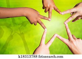 Kids joining fingers forming a star.