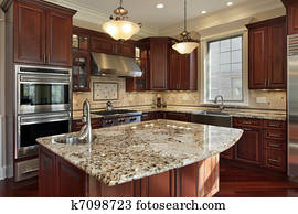 Kitchen with granite island Kitchen with granite island