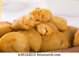 Rissole - Shrimp rissole served with chili sauce on the table.