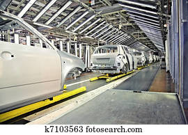 cars in a row at car plant