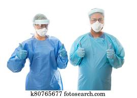 Two ICU scrub nurses in full PPE during coronavirus COVID-19 pandemic Two ICU scrub nurses in full PPE during coronavirus COVID-19 pandemic