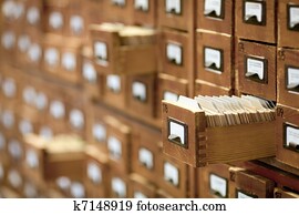database concept. vintage cabinet. library card or file catalog.