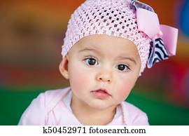 Little baby girl paying attention