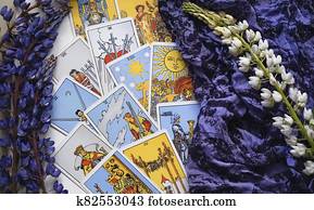 romantic Tarot Setup Background. Tarot cards and Lupin flowers. romantic Tarot Setup Background. Tarot cards and Lupin flowers.