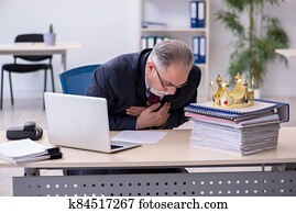 Old king businessman employee at workplace Old king businessman employee at workplace