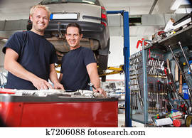Mechanics at an auto shop Mechanics at an auto shop