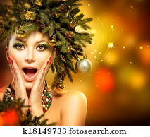 Christmas Woman. Christmas Holiday Hairstyle and Makeup