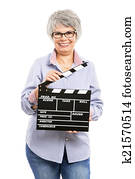 Elderly woman holding a clapboard