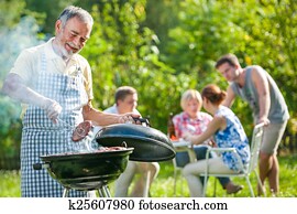 Family having a barbecue party Family having a barbecue party