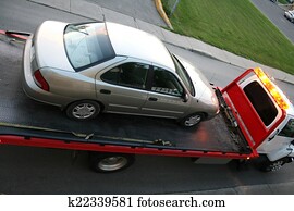 Car on a flatbed truck Car on a flatbed truck