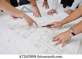 Team of architects on construction site Team of architects on construction site