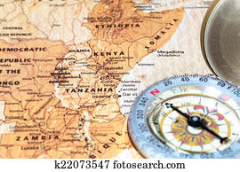 Travel destination Tanzania and Kenya, ancient map with vintage compass
