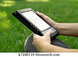 Young Woman Reading on eBook Young Woman Reading on eBook