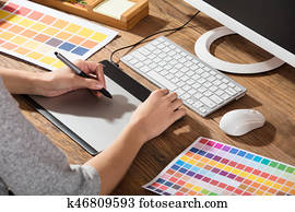 Graphic Designer Using Graphic Tablet Graphic Designer Using Graphic Tablet