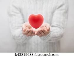 Man giving red heart. Love concept Man giving red heart. Love concept