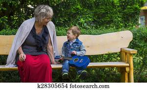 Grandmother and grandson singing together