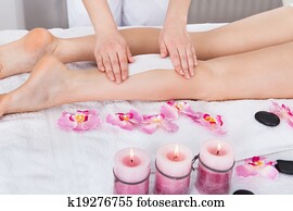 Beautician Waxing Woman's Leg Beautician Waxing Woman's Leg