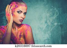 Beautiful young woman with conceptual colourful body art Beautiful young woman with conceptual colourful body art