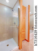 Shower and tub in a new bathroom with closet