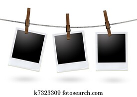 blank photo frames on a clothesline 