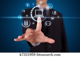 Businessman pressing virtual media type of buttons 