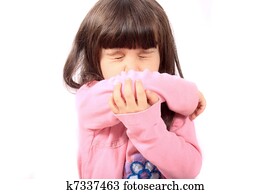 Sick child sneezing