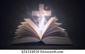 Christianity concept. Open shining holy bible and cross above. Christianity concept. Open shining holy bible and cross above.