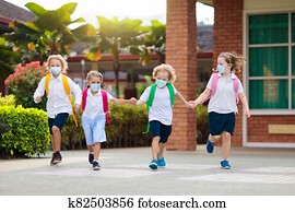 Kids on first school day after quarantine. Kids on first school day after quarantine.