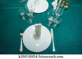 Table set for an event party or wedding reception. Empty glasses in restaurant Table set for an event party or wedding reception. Empty glasses in restaurant