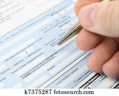 Filling out   application form.