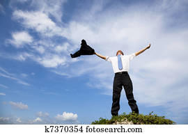 relaxed business man  stand on the peak