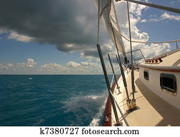 Sailing in stormy weather in tropical climate