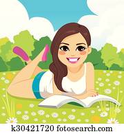 Woman Reading In Park