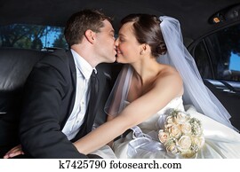 Wedding Couple Kiss in Limo Wedding Couple Kiss in Limo