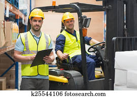Worker and forklift driver