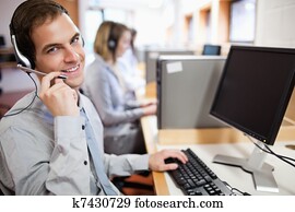 Assistant using a headset Assistant using a headset