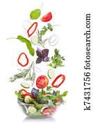 Falling vegetables for salad isolated on white Falling vegetables for salad isolated on white