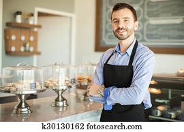 Male business owner in a bakery Male business owner in a bakery