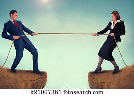 man and woman tug of war